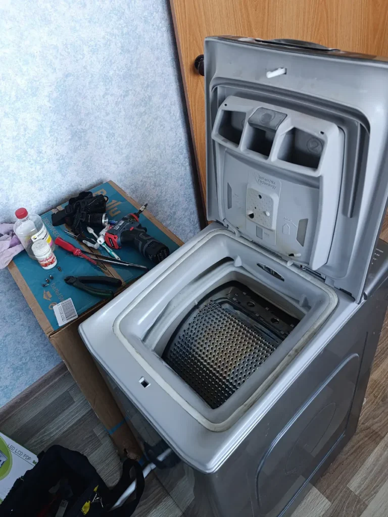 Замена рамки люка стиральной машины Haier с вертикальной загрузкой